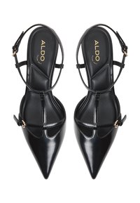 Tacchi in vernice nera con punta affusolata, design a T-strap e fibbia alla caviglia. Presenta una soletta imbottita con il marchio "ALDO".