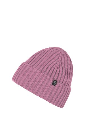 Pink knitted beanie with ribbed texture and fold-over cuff. Features a small black label with white lettering. Soft, warm material.