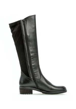 Black knee-high boots with a smooth leather front and ribbed fabric back, featuring a side zipper and a low block heel.