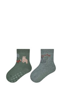 Green cotton socks featuring animal graphics. One sock shows a bear and fox, the other displays a grey elephant with red accents. Anti-slip sole design.