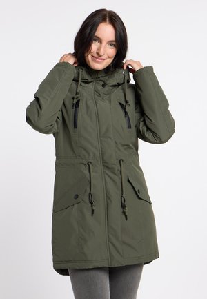 Olive green parka jacket with a high collar, drawstrings, two zippered chest pockets, and large side pockets, made from a textured, water-resistant material.