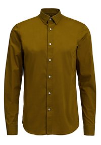 Pitkähihainen paita oliivinvihreää puuvillaa, jossa on napillinen etuosa, terävä kaulus ja pyöristetty helma. Edessä valkoiset napit.