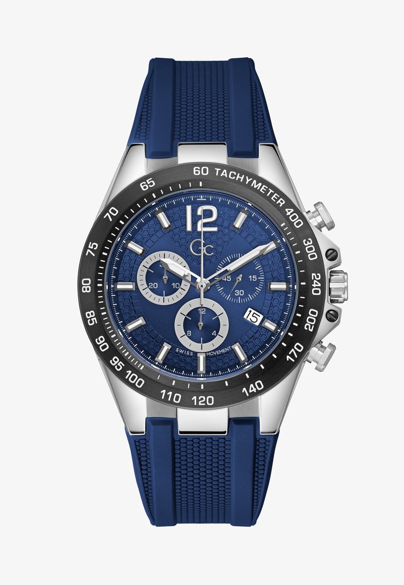 Kronograaf kellal on sinine tekstuuriga kellanägu, hõbedased aktsendid, must taksiimeeter ja sinine kummirihm, millel on meshtaru muster.