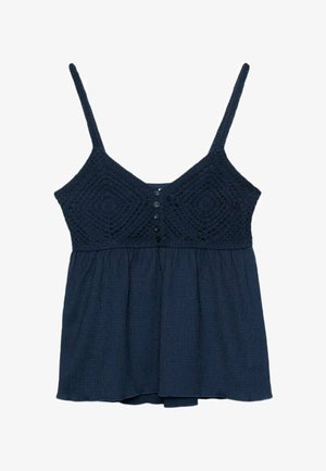 Débardeur bleu marine avec bretelles spaghetti réglables, corps en crochet texturé et bas fluide froncé. Dispose de boutons sur le devant au centre.