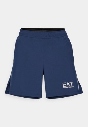 Marine idrettsshorts laget av lett materiale. Har elastisk midjebånd og sidespalter med reflekterende detaljer. Logo trykt foran.