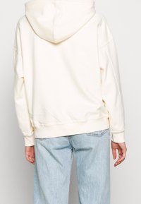 Levi's® Jersey con capucha - off-white