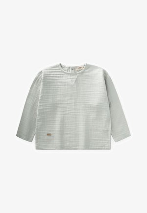 Jasnoszary, długi rękaw bluzka z teksturowanej tkaniny. Posiada dekolt w kształcie V oraz małą metkę na dolnej stronie, z luźnym krojem.