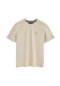 T-shirt di cotone beige con scollatura a girocollo e maniche corte. Presenta un piccolo logo scuro sulla parte sinistra del petto. Texture liscia.