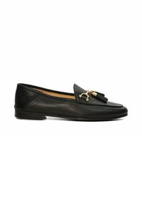 Black leather loafers featuring a flat heel, a rounded toe, and gold-tone hardware with tassels on the front for added detail.