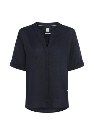 Blouse courte bleu marine à manches courtes avec encolure ronde, petite découpe en V, manches retroussées et détails discrets de couture devant.