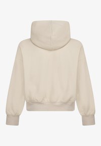 Šviesiai smėlinė, trumpa džemperių su gobtuvu, plačiomis rankovėmis ir raukšlėtais rankogaliais. Pagaminta iš švelnios medžiagos su lygiu paviršiumi. Be matomų logotipų.