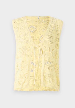 Gelber Strickwesten mit V-Ausschnitt, offenen Mustern und Krawattenverschluss vorne. Weicher Stoff mit lässiger Passform.