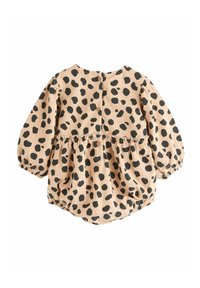 Topp med leopardtryck i beige med svarta fläckar. Har puffärmar, samlad midja och knappstängning i ryggen. Mjuk tygtextur.
