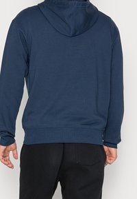 New Balance Jersey con capucha - dark blue