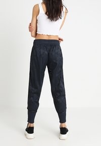 Nike Sportswear Tygbyxor - dark blue