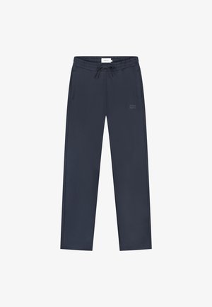 Marineblaue gerade geschnittene Sweatpants mit elastischem Bund, Kordelzug, seitlichen Taschen und kleinem "PURE PATH"-Text am linken Oberschenkel.