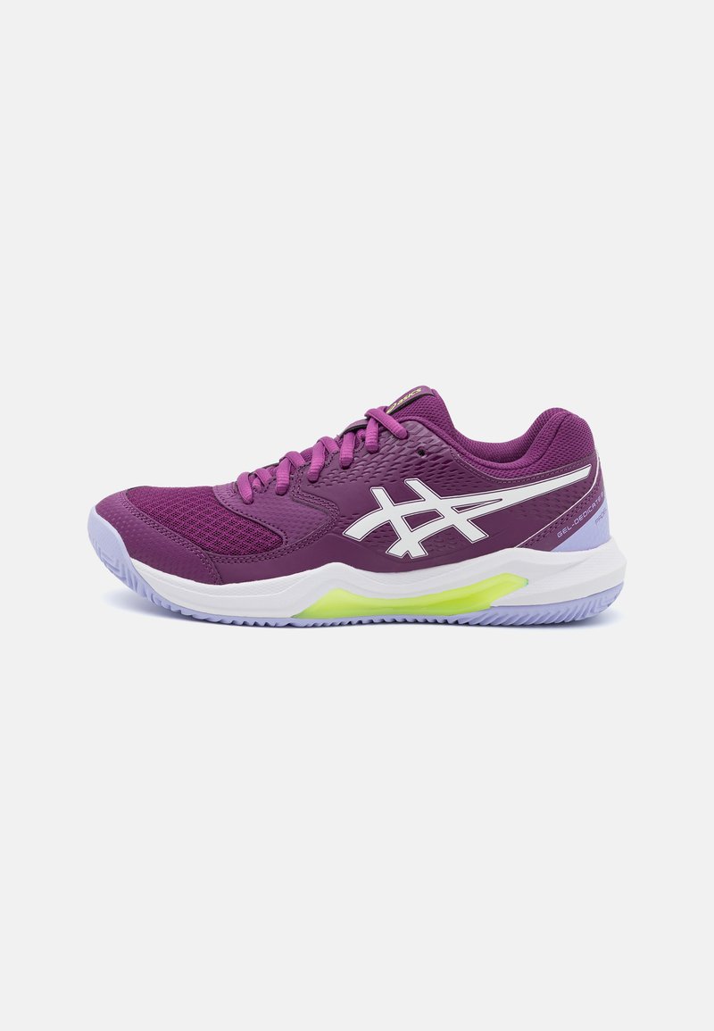 Purple athletic shoes with mesh upper, white and green accents, textured design, padded collar, and rubber outsole for grip.