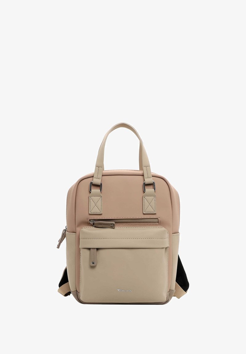 Beež ja pruun seljakott kahekordsete käepidemete, esi tõmbe-tasku, reguleeritavate rihmade ja sileda tekstuuriga. Omab minimalistlikke disainipunkte.