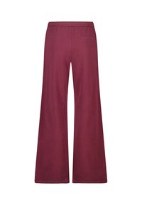 Burgundin leveälahkeiset housut, jotka on valmistettu pehmeästä kankaasta. Housuissa on joustava vyötärö ja yksi takatasku. Sileä rakenne ja yhtenäinen viimeistely.