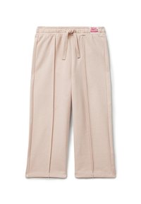Světlé růžové kalhoty z měkké bavlněné směsi s elastickým pasem a šnůrkou na stažení. Mají přehyby a šité lemy.