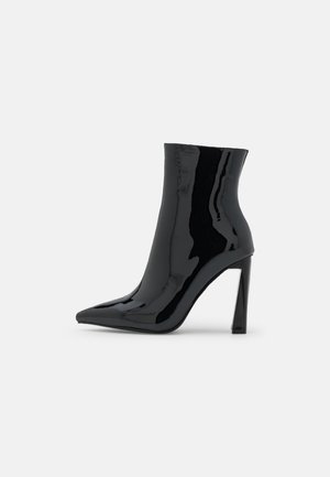 Stivaletti con tacco - black