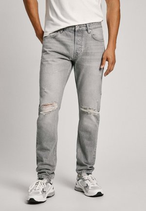 Gray denim jeans with a relaxed fit, featuring distressed rips on the knees, subtle fading, and a classic five-pocket design.
