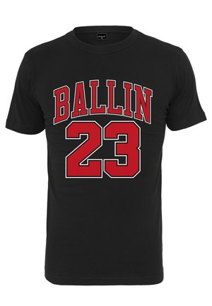 Black cotton t-shirt with short sleeves featuring "BALLIN" in red lettering above the number "23," outlined in white. Classic, athletic design.