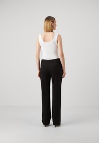 Guess ZOE PANTS - Hlače - jet black