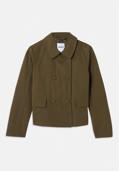 Brown double-breasted jacket with a wide collar, featuring two front pockets and a smooth texture; label visible inside.