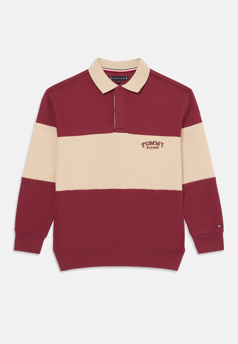 Langærmet polo i bordeaux og creme, med krave, frontlogo og ribbede manchetter. Fremstillet af textureret stof med kontrasterende farver.