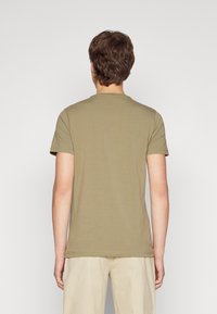 Calvin Klein Paprasti marškinėliai - delta green