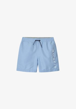 Bañador de color azul claro con cintura elástica, cordón y la marca blanca "HACKETT LONDON" en el lado izquierdo. Textura suave.