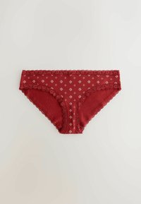 Røde bomulds trusser med blondekant og små hvide blomster mønstre. Designs inkluderer bølgede kanter for ekstra detaljer.