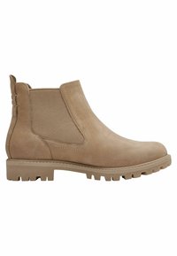 Botas de tobillo beige con un acabado de piel suave, paneles laterales elásticos y una suela de goma texturizada con profundos relieves para mayor agarre.