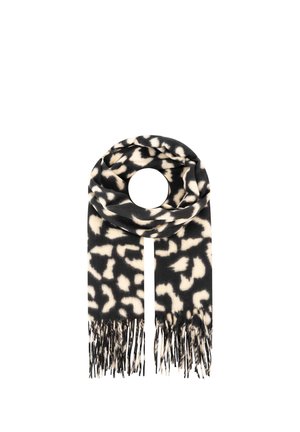 Schwarz-weißes Tierfellmuster-Tuch mit Fransenenden, in runder Form auf einem weißen Hintergrund gefaltet.