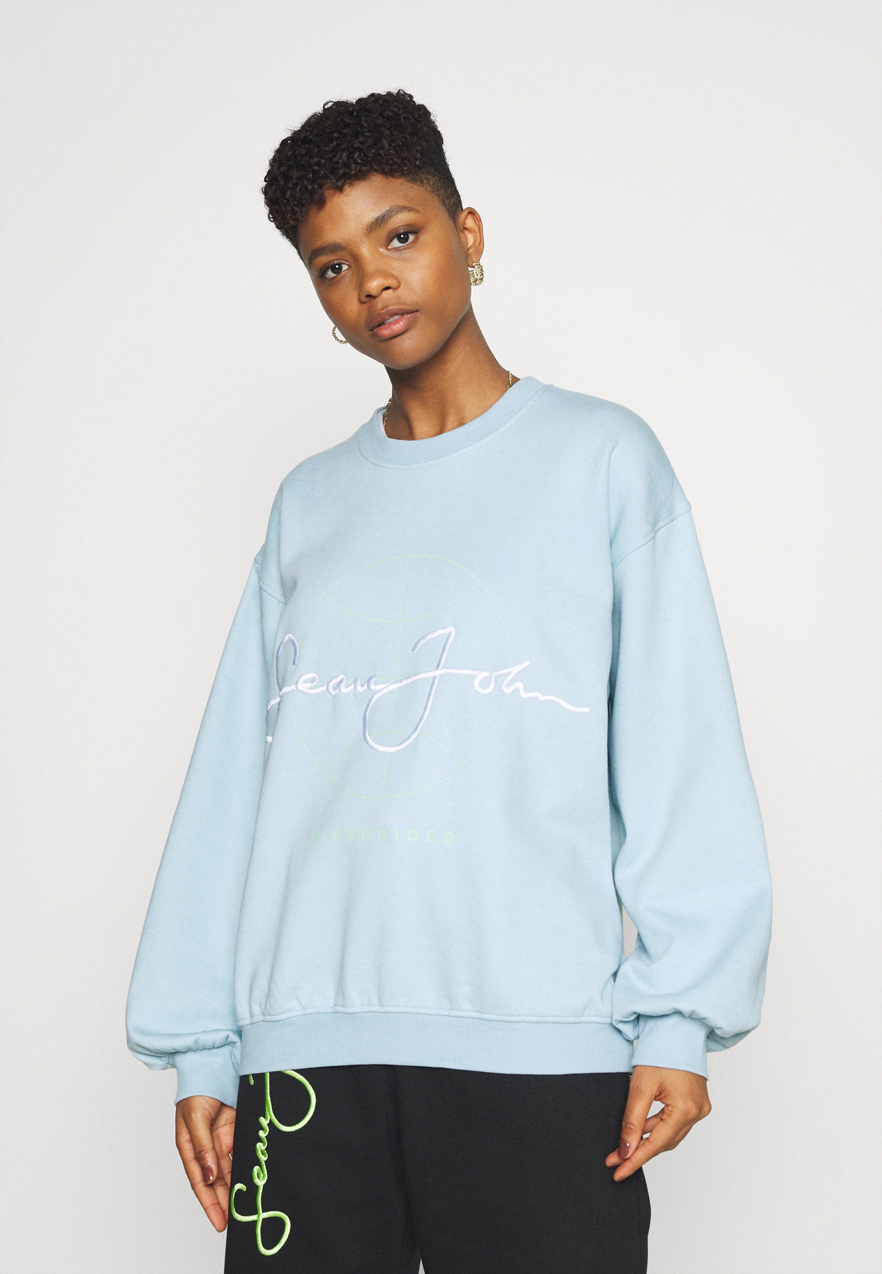 grey jumper with sequins