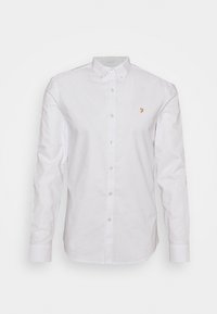 Bílá košile na knoflíky s dlouhým rukávem, s malým hnědým vyšívaným logem "F" na levé straně hrudi a zapínacím límečkem.