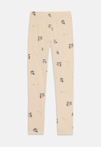 Crème-kleurige legging met een zachte textuur, voorzien van een herhaald perzik- en bladpatroon in tinten van roze en groen. Inclusief elastische tailleband.