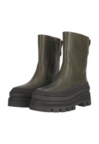 Vihreät nahka ankle-boots, joissa on paksu musta pohja, sivuvetoketju ja vetotappi. Sileä päällinen, jossa on kontrastisia tekstuureja ja pyöristetty kärki.