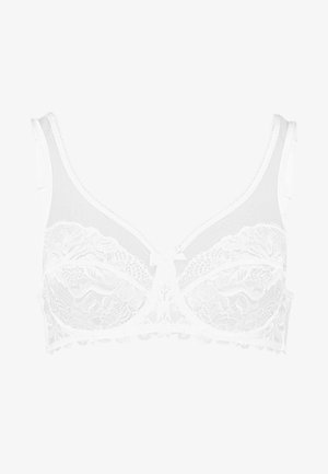 White bra with lace cups, ribbon bow detail at center, and smooth straps. Features a scalloped hem and sheer paneling for added texture.
