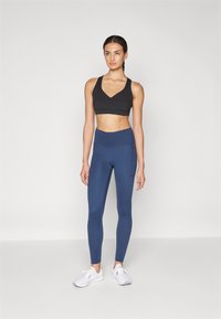 New Balance HARMONY POCKET HIGH RISE LEGGING - Legingi - navy