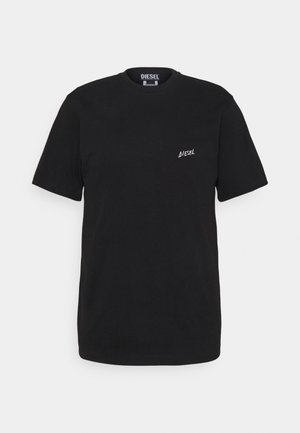 Sort t-shirt med korte ærmer og rund hals med lille hvidt "Diesel" logo på venstre bryst og synligt mærke inde i kraven.