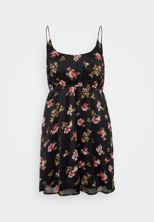 Crna cvjetna haljina s tankim naramenicama, strukirana, s lepršavom suknjom. Ima ružičaste i žute cvjetove na prozirnom materijalu. Ljetni dizajn.