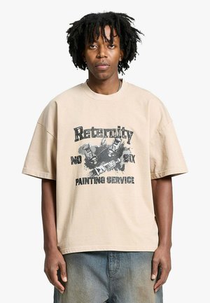 T-shirt con stampa - beige