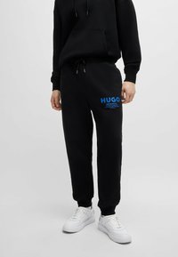 HUGO Pantalones deportivos - black one