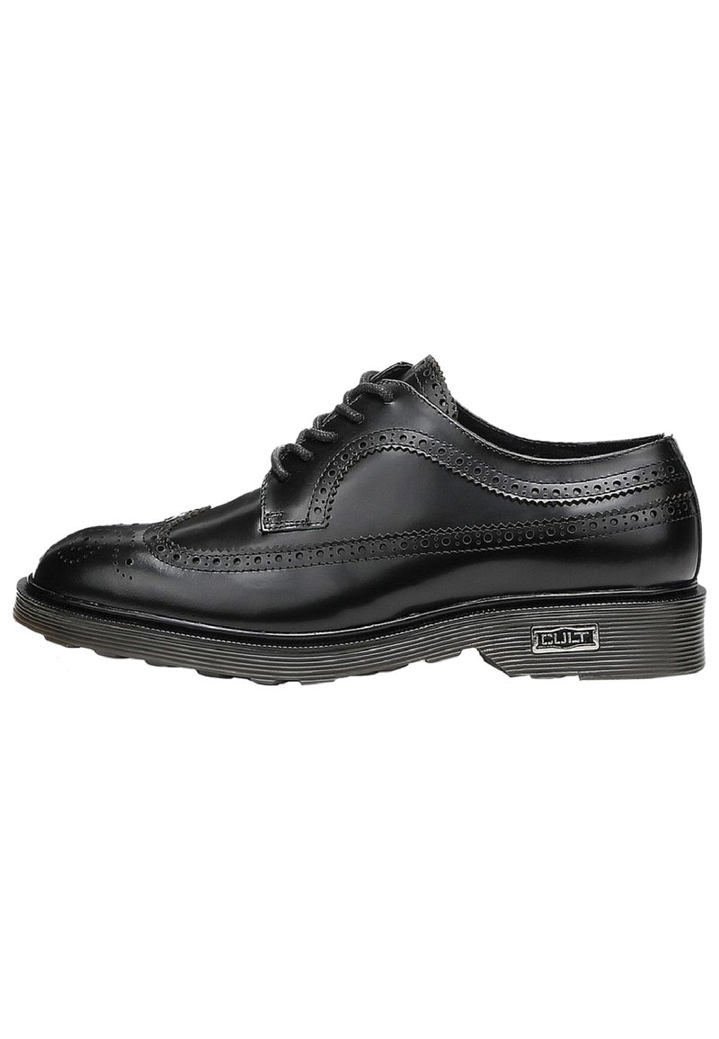 Scarpa brogue nera in pelle con perforazioni decorative, punta rotonda e suola in gomma grigia. Presenta sei occhielli e un accento con marchio sul lato.