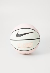 Nike basketball, white and pale pink, textured rubber surface, black accent lines, "ALL-COURT INDOOR/OUTDOOR" printed in pink.