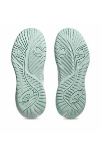 Semelles de chaussures en caoutchouc vert clair avec des motifs texturés et des rainures ; présente des détails d'accent circulaires au niveau du talon et de la partie avant.