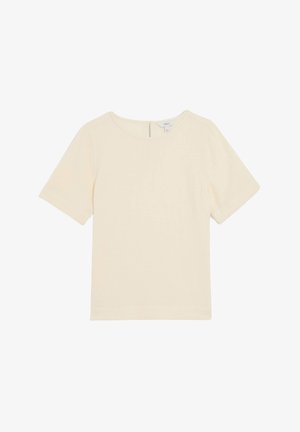 Top crema de manga corta con escote redondeado, textura suave y un sutil detalle de costura en la parte posterior. Fabricado con un tejido ligero y transpirable.