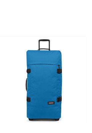 Valigia a rotelle in tessuto blu brillante, forma rettangolare, dotata di manico retrattile, impugnatura laterale e dettagli in plastica nera.